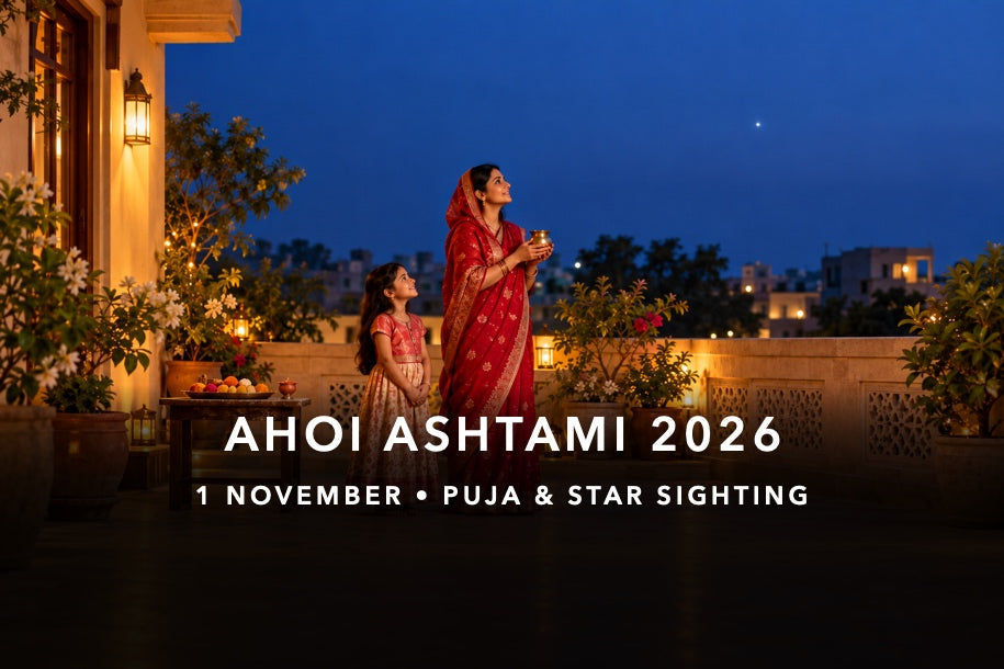 Mother holding a brass water vessel with her daughter beneath an evening star for Ahoi Ashtami on 1 November 2026