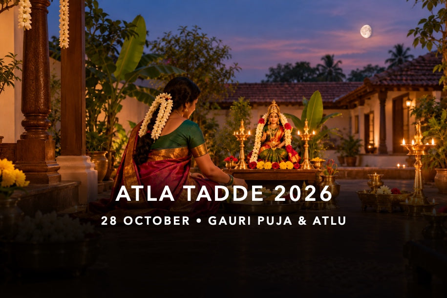 Gauri murti and a Telugu devotee offering atlu in a courtyard for Atla Tadde on 28 October 2026