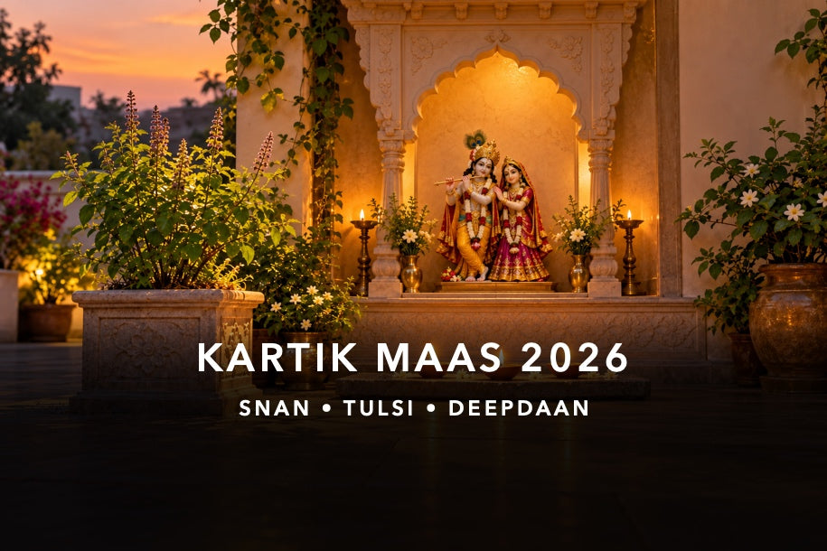 Radha and Krishna murtis, a Tulsi plant and safely arranged earthen lamps for Kartik Maas 2026, North Indian calendar beginning 27 October