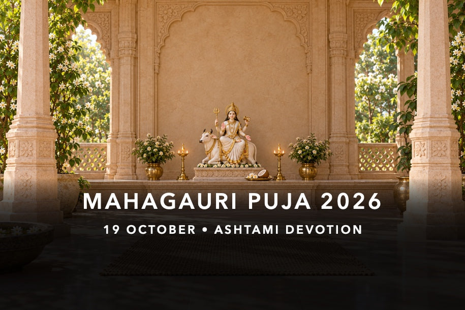 Four-armed Maa Mahagauri murti in white on a bull, with trident, damaru and coconut bhog for puja on 19 October 2026