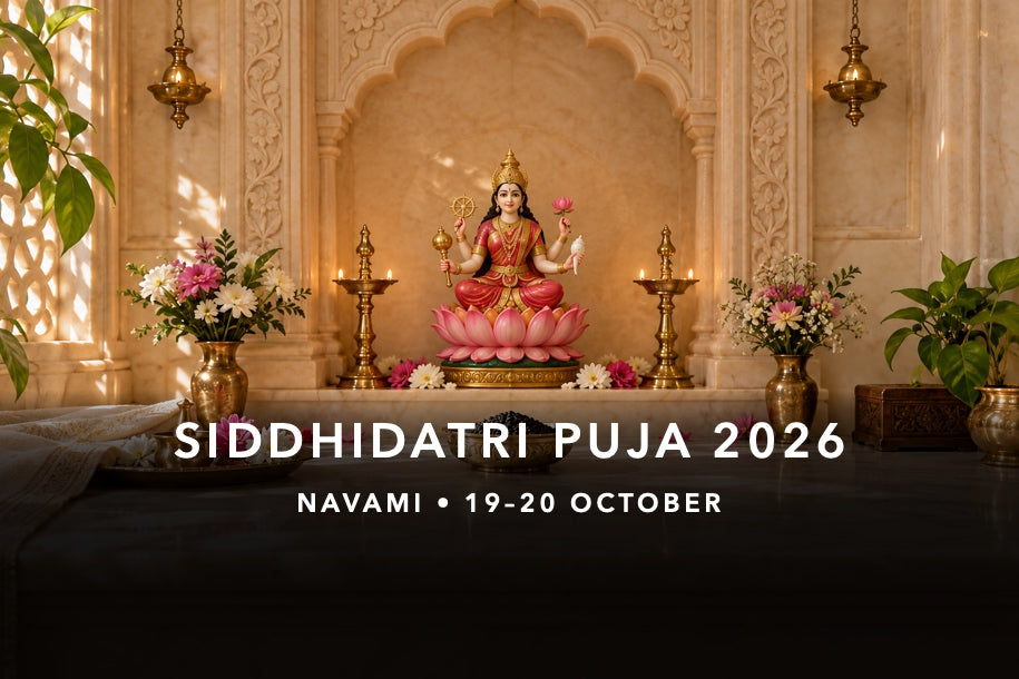 Four-armed Maa Siddhidatri murti seated on a lotus with mace, chakra, conch and lotus flower, with sesame bhog for Navami worship on 19–20 October 2026