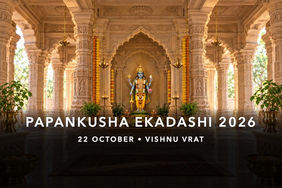 Four-armed Lord Vishnu murti with conch, chakra, mace and lotus in a sandstone shrine for Papankusha Ekadashi on 22 October 2026