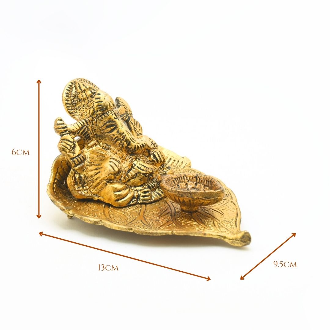 Ganesh Idol With Leaf Metal Diya