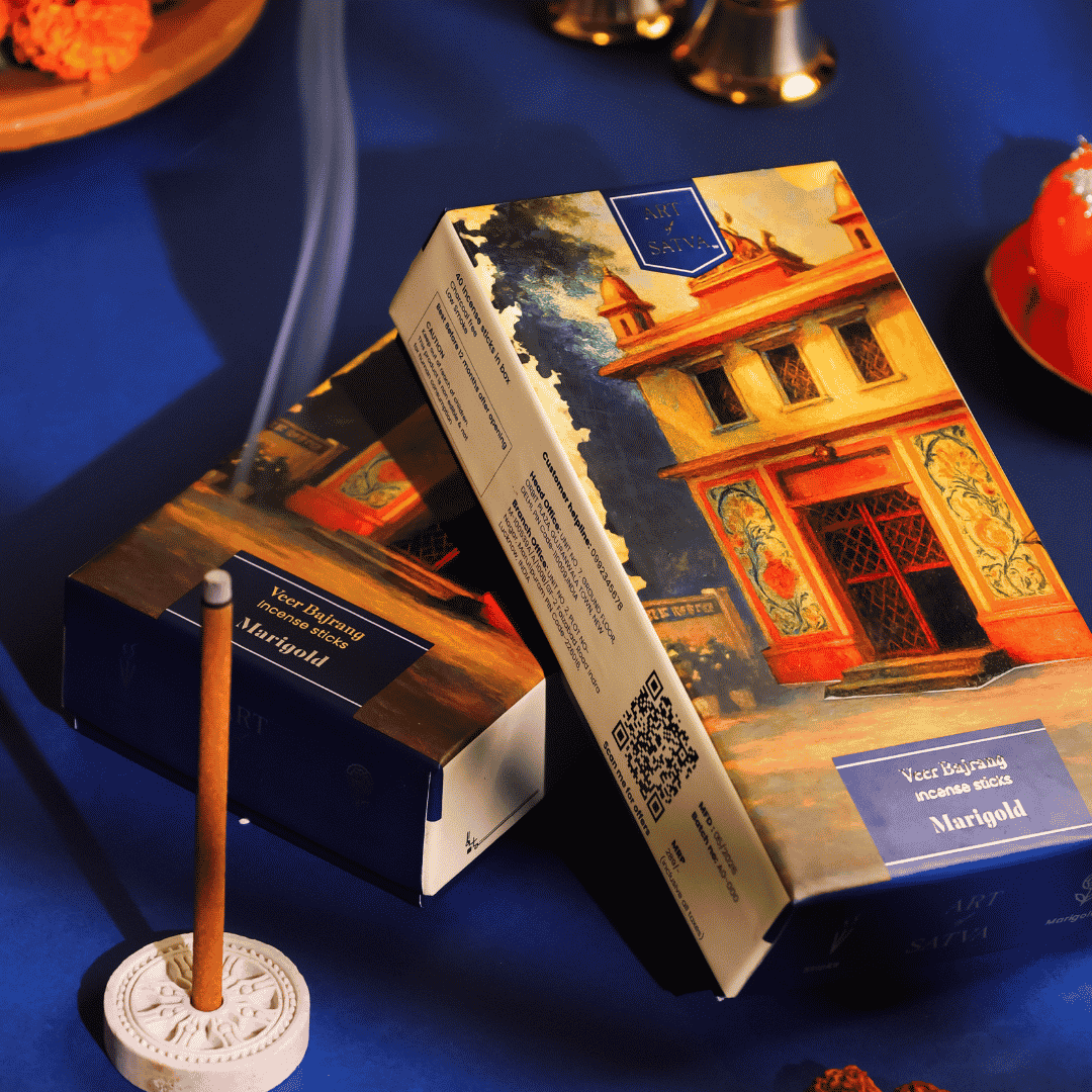 Marigold Veer Bajrang packs with a lit incense stick - Sanatana Journey