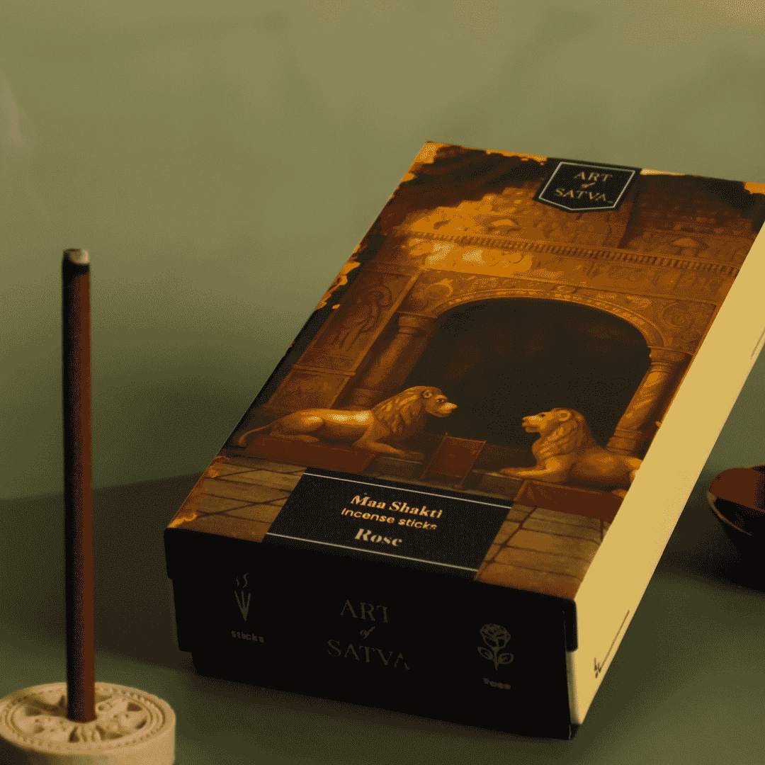 Rose Maa Shakti incense pack with a lit stick - Sanatana Journey