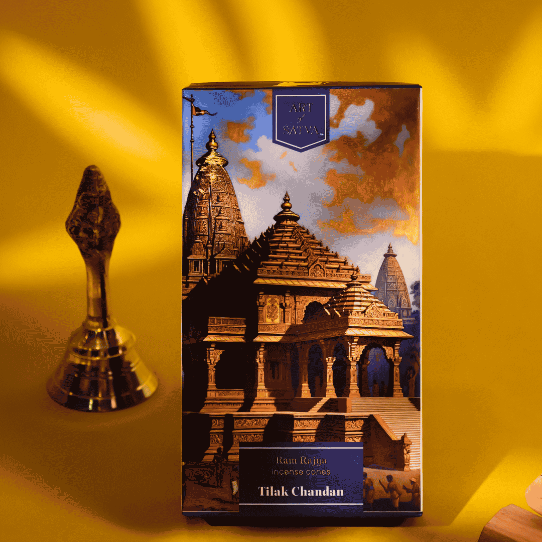 Tilak Chandan pack with temple bell in a devotional setting - Sanatana Journey
