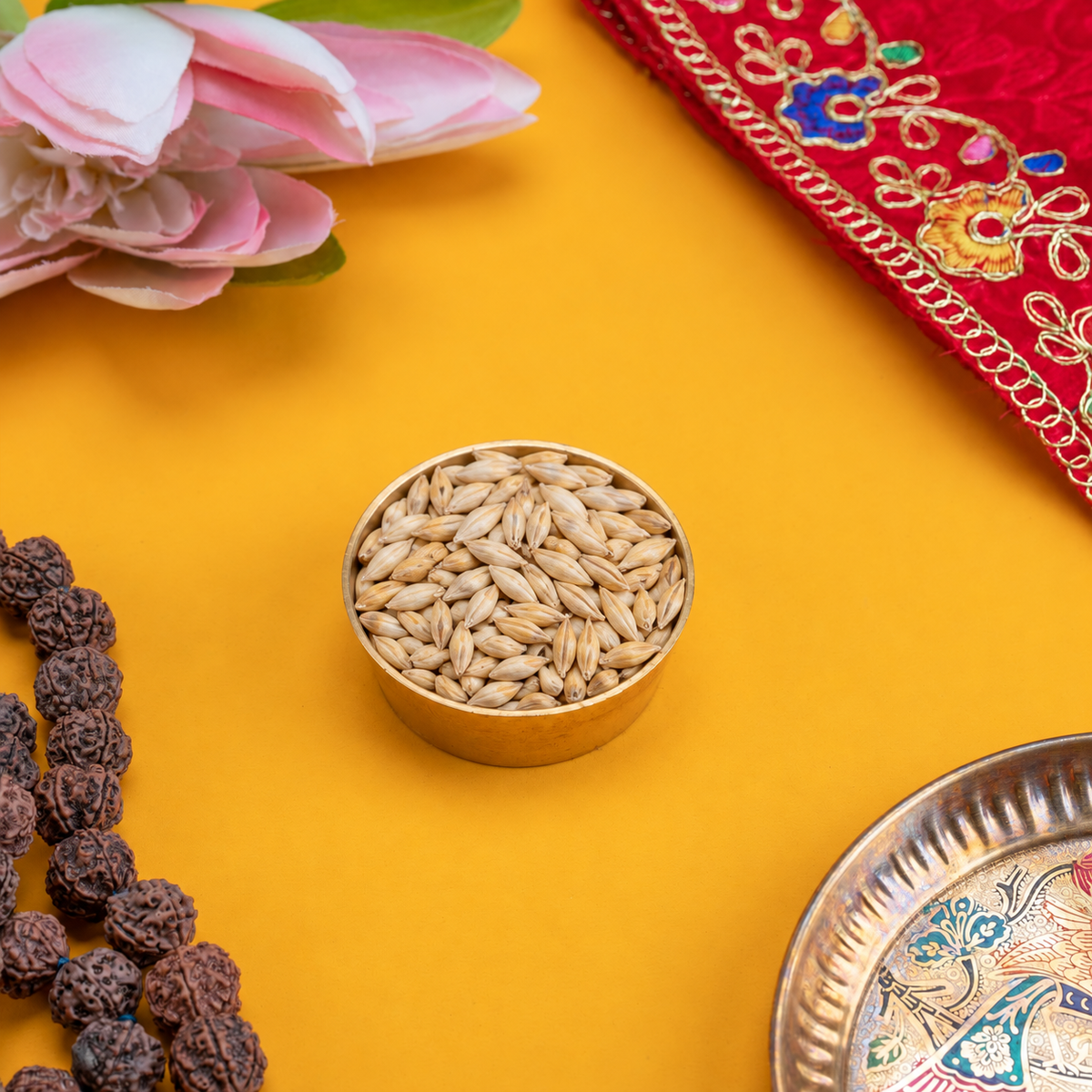 Jau barley grains for puja in a brass bowl