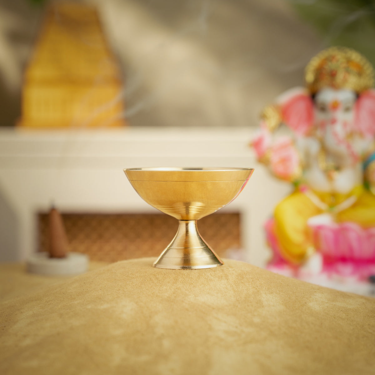 Pure brass diya for daily puja shown unlit