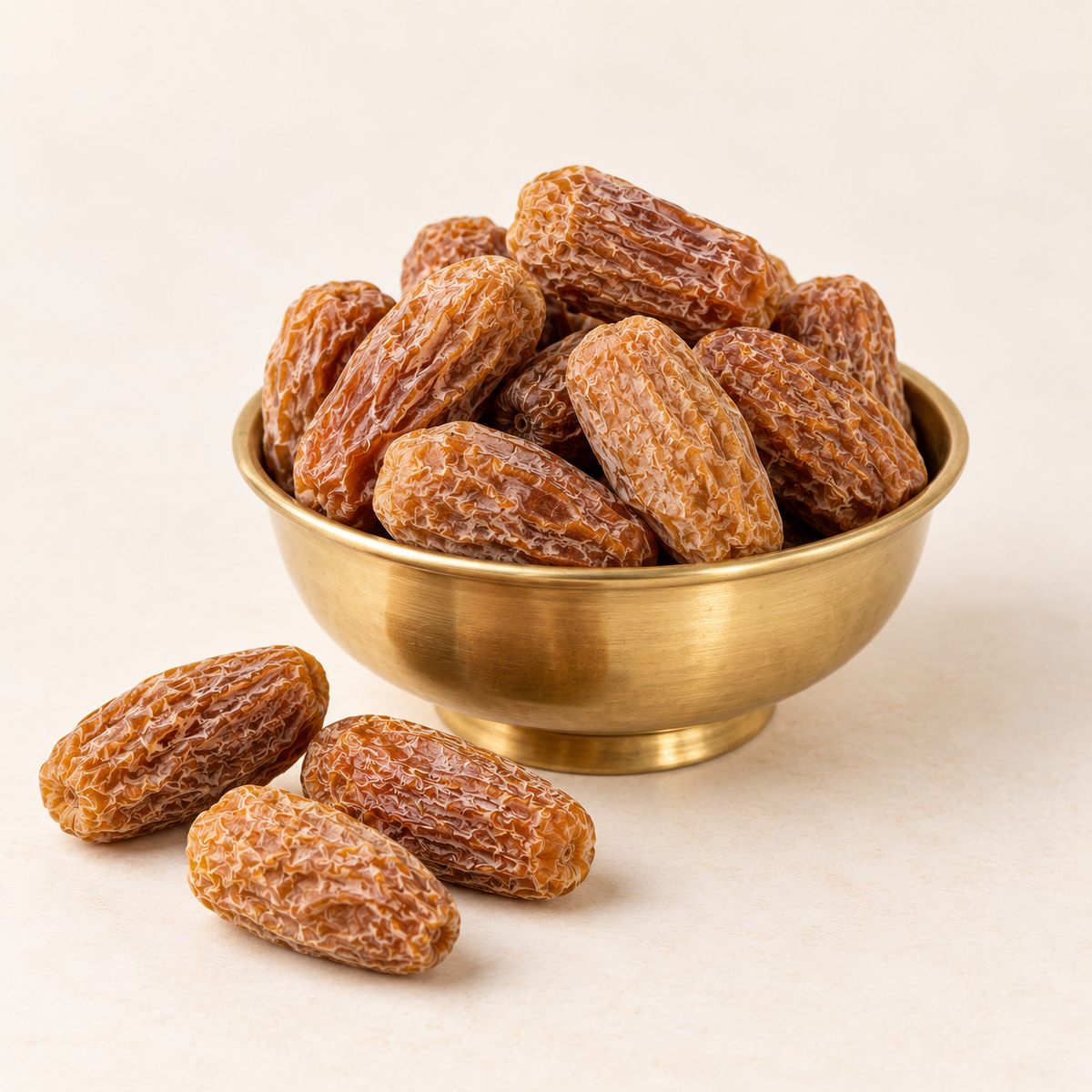 Sukha Khajoor Chuhara in a brass bowl for puja and prasad